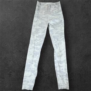 Lululemon Wunder Train HR Tight 25” — Size 4 (LW5CQUS)